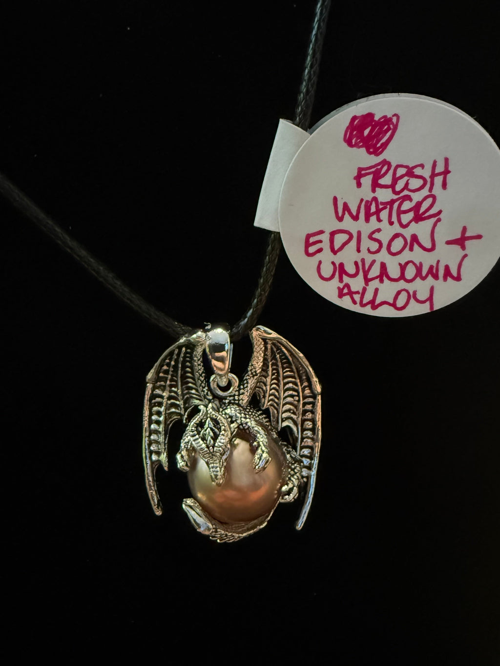 Dragon holding Edison